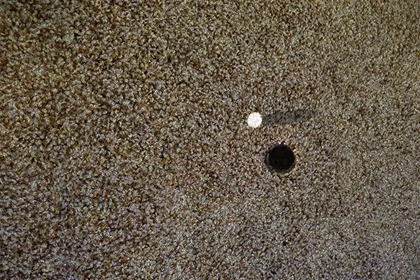 How to Fix a Hole in Carpet Without Extra Carpet
