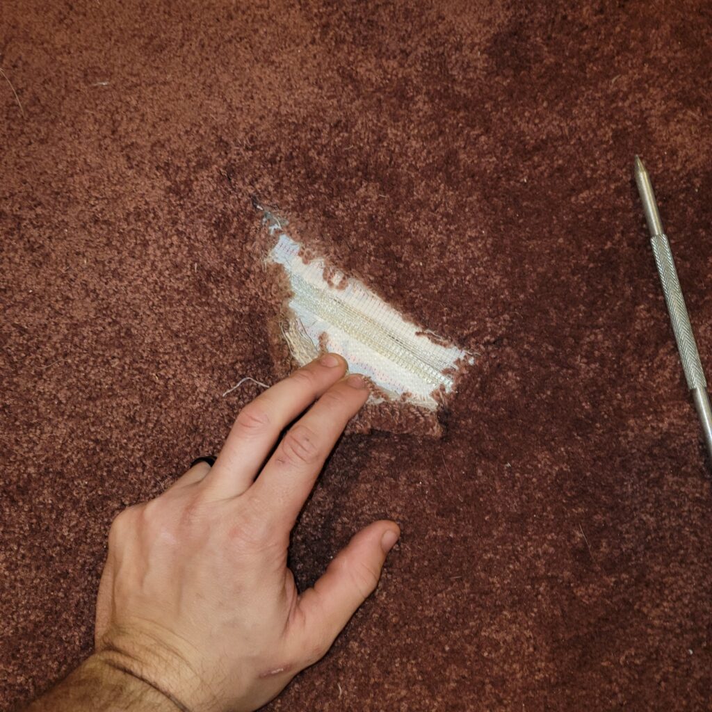 How to Fix a Hole in Carpet Without Extra Carpet